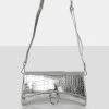 Public Desire UK The Kemi Silver Arched Crossbody Mini Handbag