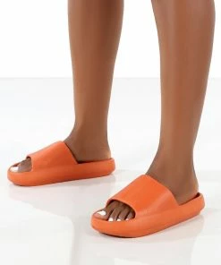 Public Desire UK Flex Orange Rubber Flat Sliders
