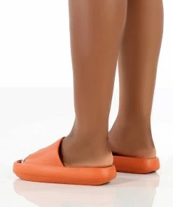 Public Desire UK Flex Orange Rubber Flat Sliders