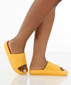 Public Desire UK Flex Yellow Rubber Flat Sliders