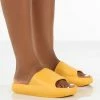 Public Desire UK Flex Yellow Rubber Flat Sliders