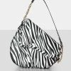 Public Desire UK The Fox Zebra Saddle Shoulder Bag