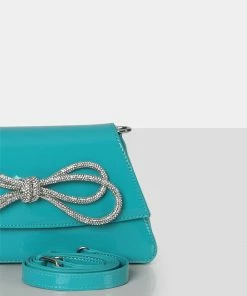 Public Desire UK NEW IN The Faya Teal Bow Detail Diamante Crossbody Bag