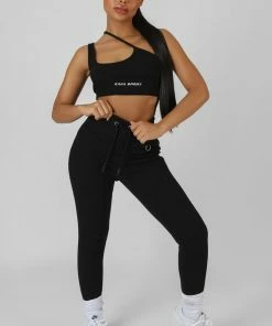 Public Desire UK Asymmetric Strappy Kaiia Sport Crop Top Black