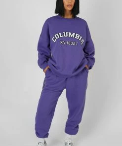 Public Desire UK KAIIA CLOTHING Oversized Columbia Slogan Sweatshirt Purple
