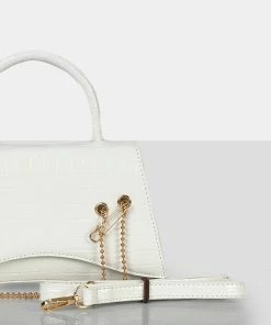 Public Desire UK The Trista White Croc Arched Mini Handbag