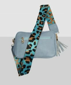 Public Desire UK The Casey Baby Blue Animal Print Strap Zip Up Crossbody Bag