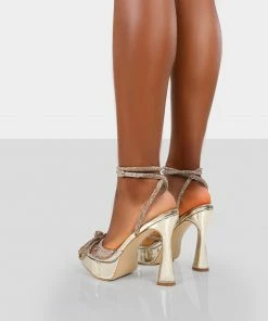 Public Desire UK Mimi Gold Mirror Platform Court Bow Heels