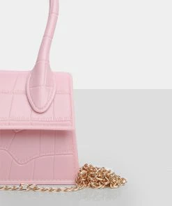 Public Desire UK The Alora Pink Rubber Effect Mini Bag