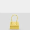 Public Desire UK The Alora Yellow Rubber Effect Mini Bag