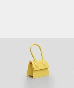 Public Desire UK The Alora Yellow Rubber Effect Mini Bag