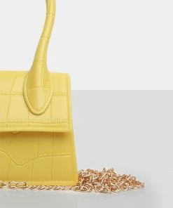 Public Desire UK The Alora Yellow Rubber Effect Mini Bag