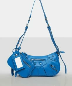 Public Desire UK The Trackstar Blue Pu Studded Mirror Zip Detail Handbag