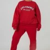 Public Desire UK Curve Oversized Embroidered Slogan 90S Joggers Red