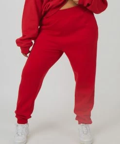 Public Desire UK Curve Oversized Embroidered Slogan 90S Joggers Red