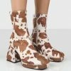 Public Desire UK Imagine Brown Cow Print Chunky Heel Ankle Boots