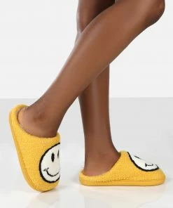 Public Desire UK SMILE YELLOW PRINTED SMILEY FACE SLIPPERS NEW IN