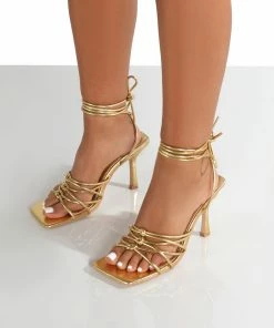 Public Desire UK KERI GOLD STRAPPY LACE UP MID HEELS